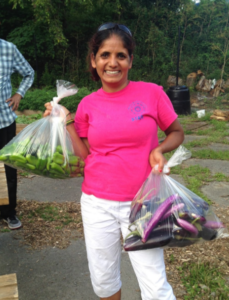 Januka Regmi, manager of SHIM's Whitehall Peace and Community Garden